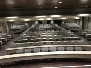 Fixed lecture hall table and seating installation at Morton Plant Hospital